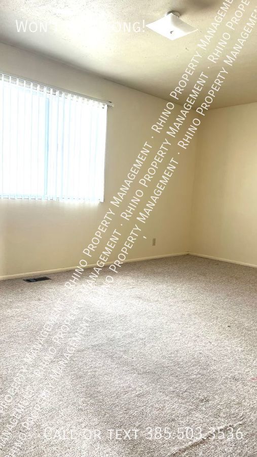 Building Photo - REDUCED RENT! 2 Bedroom/1.5 Bathroom Townh...