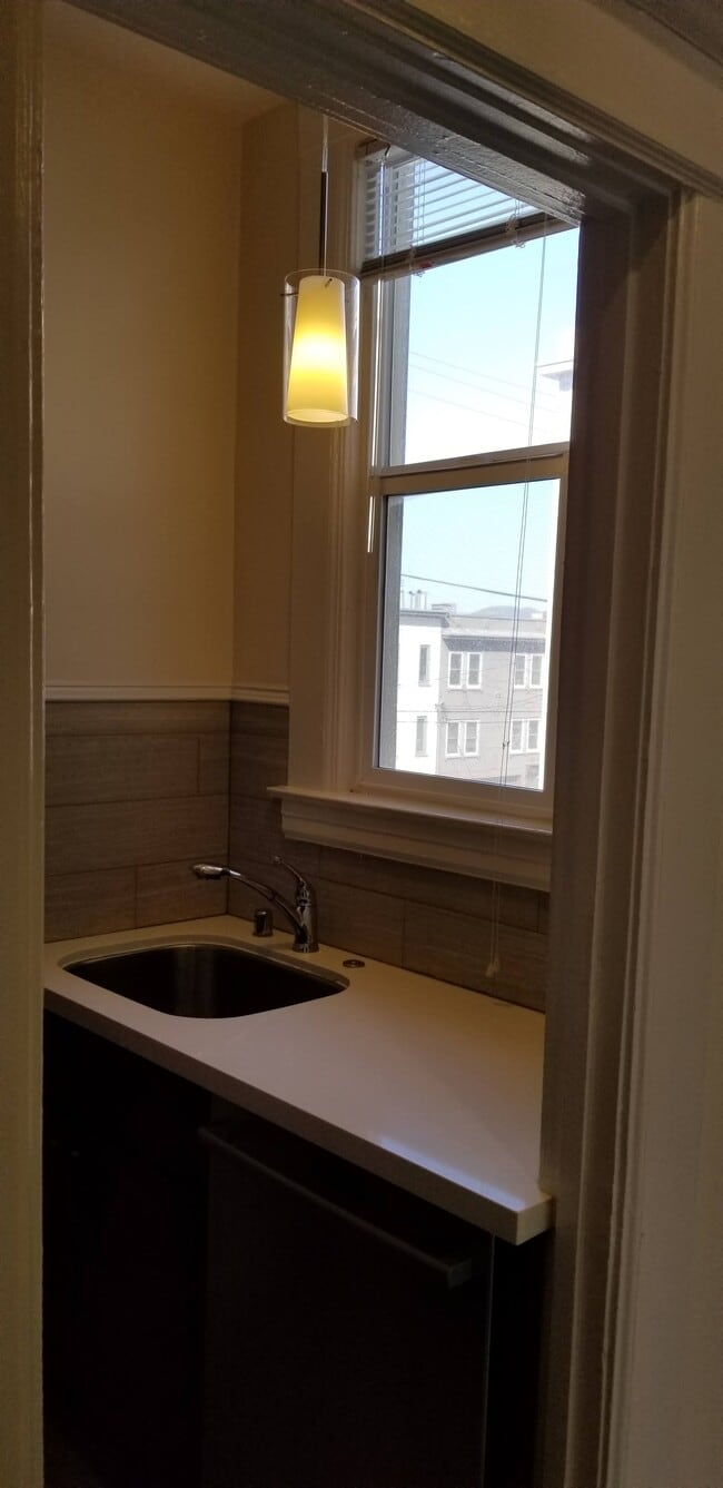 Prep Area & Dishwasher - 3222A Steiner St