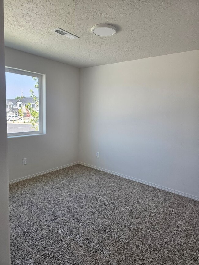 Building Photo - **NEW CONSTRUCTION**