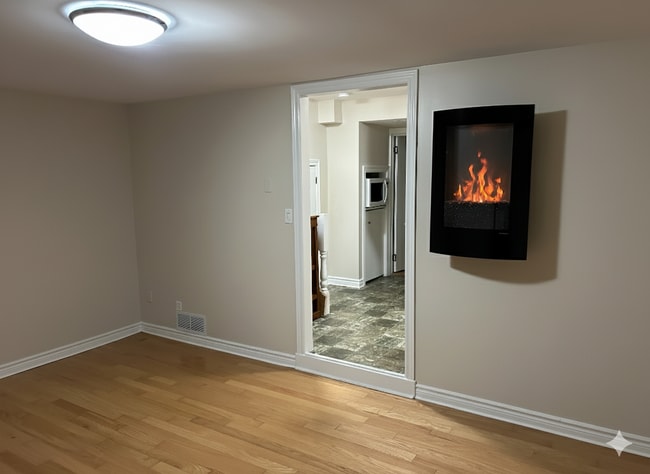 Electric FP in Living Room - 119 Main St W