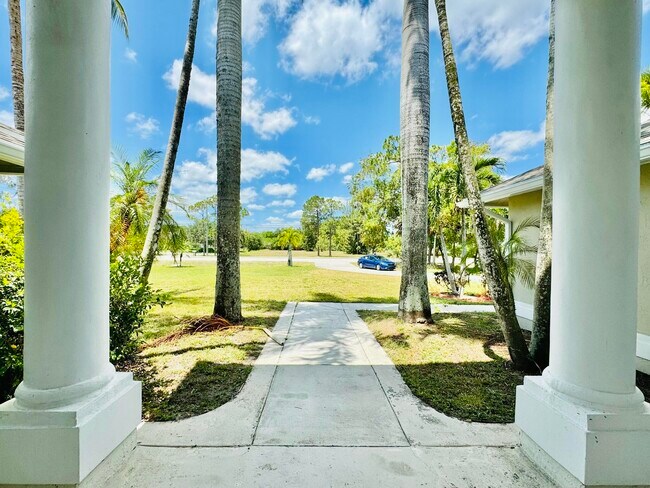 Building Photo - 6174 Royal Palm Beach Blvd