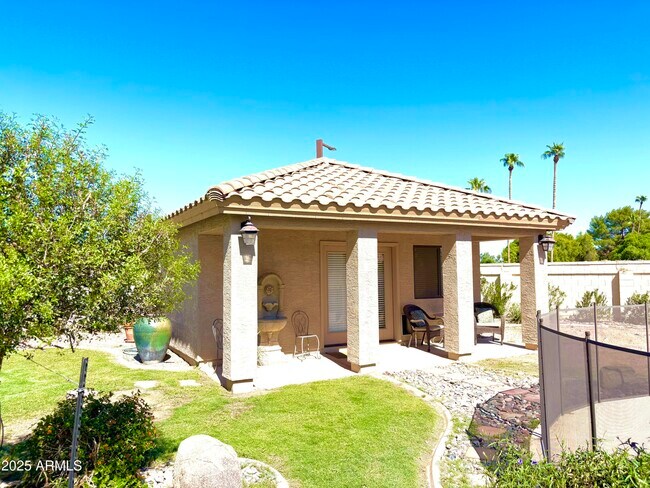 Building Photo - 9411 S Palm Dr