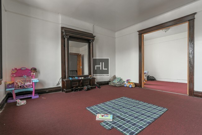 Building Photo - 74-40-74-44 44th Ave