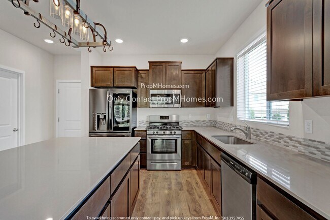 Building Photo - End-Unit Elegance: Charming Townhome in No...