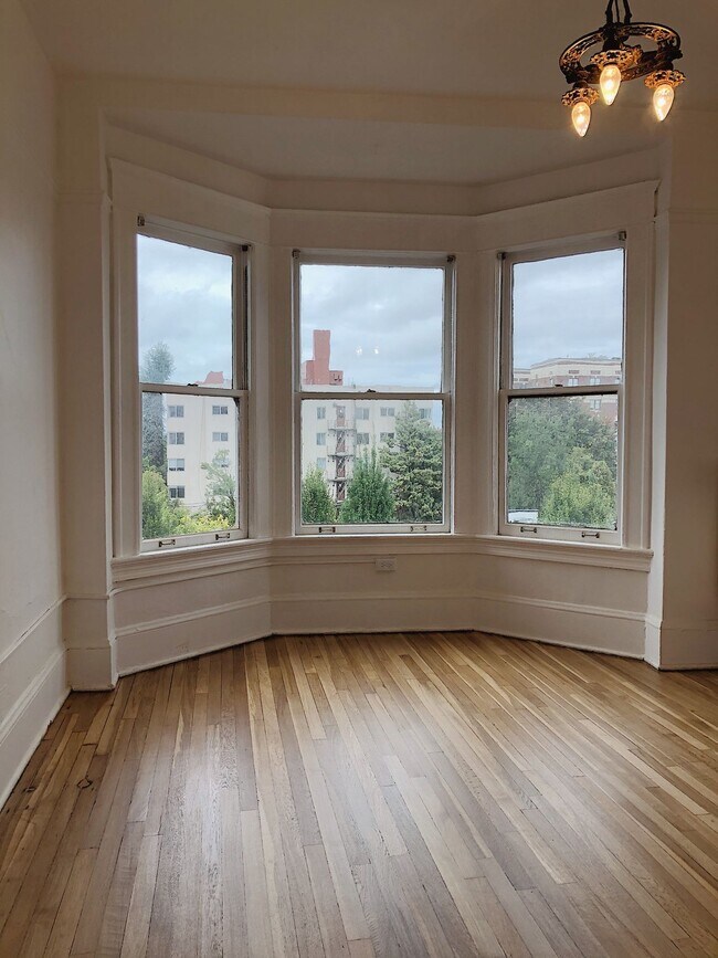 Photo - Another Move in Special in time for Spring! - NE Views out Bay Windows on the TOP FLOOR! Apartment