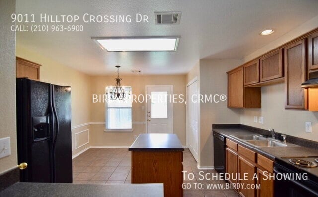 Building Photo - 9011 Hilltop Crossing Dr