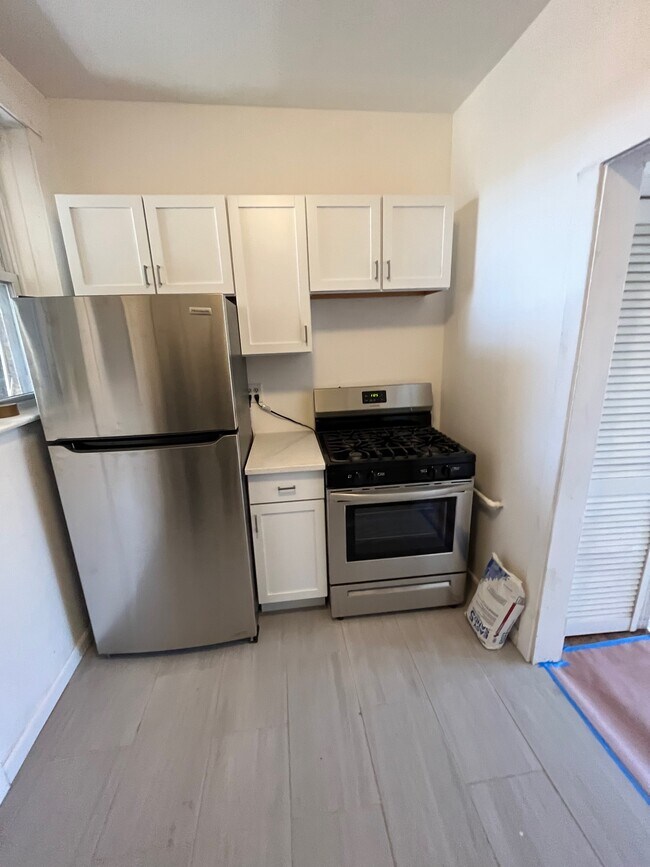 New stainless steel appliances - 3023 W Wilson Ave