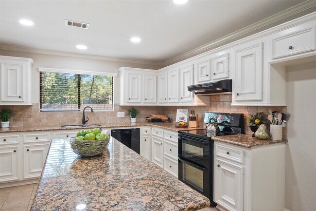 Foto del edificio - 7415 Revelwood Dr