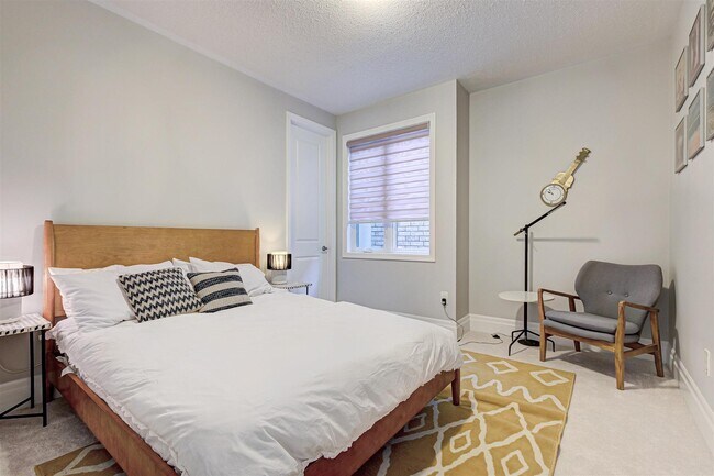 Discover the Comfort and Beauty of Bedroom D: A Cozy Retreat with a Convenient Walk-In Closet - 34 Stanley Greene Blvd