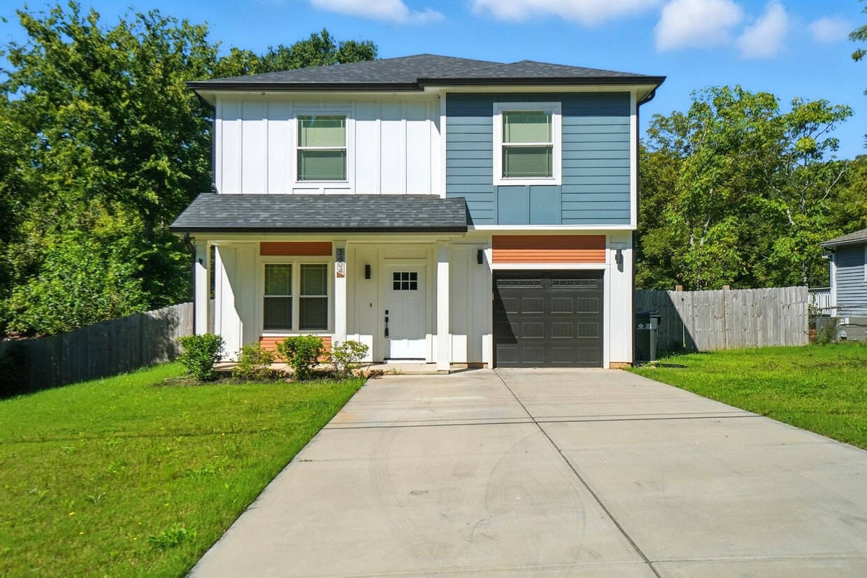 Primary Photo - Modern 3-Bedroom Home with Fenced Yard & U...