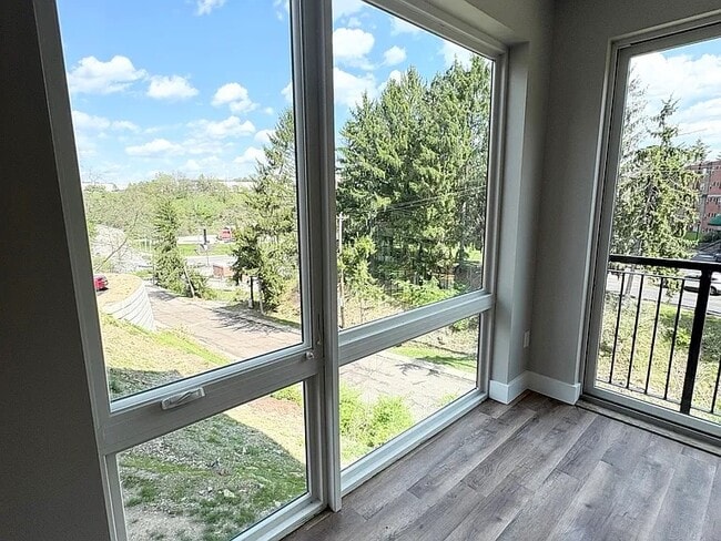 1-Bedroom - Corner Unit Living Room - Mcknight Flats