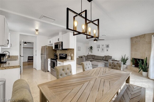 View from dining to kitchen, living - 3112 La Mesa Dr