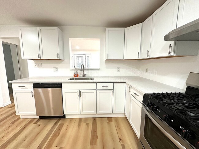 Building Photo - 6174 Poketa Rd