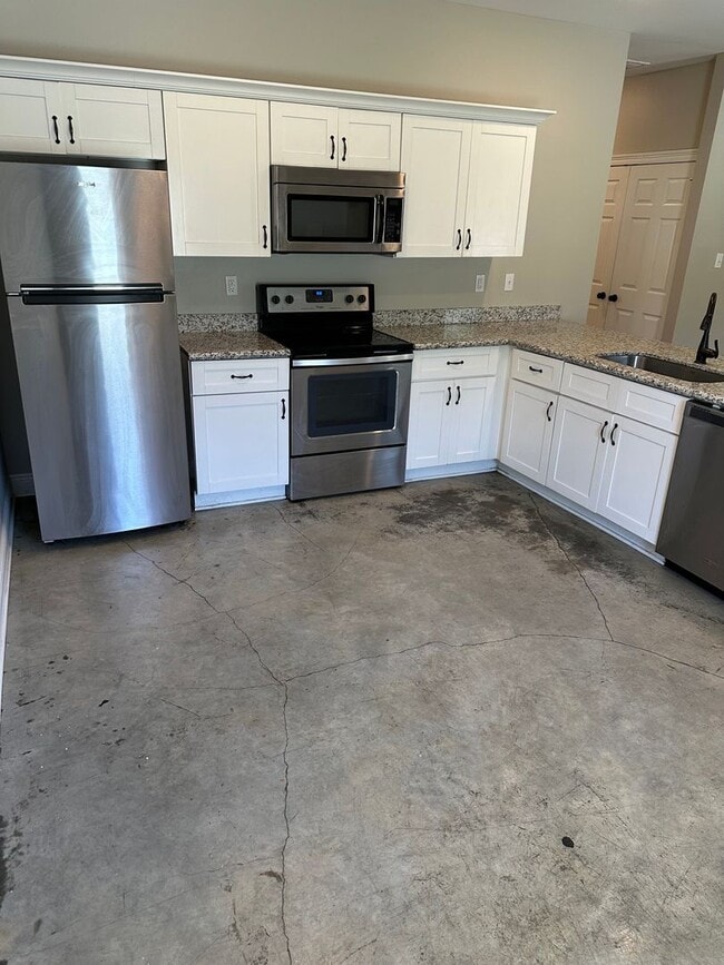 Building Photo - Available Now!