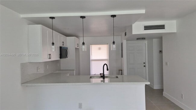 Building Photo - 6050 NW 64th Ave