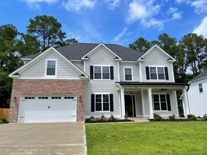 Building Photo - 565 River Oaks Ln