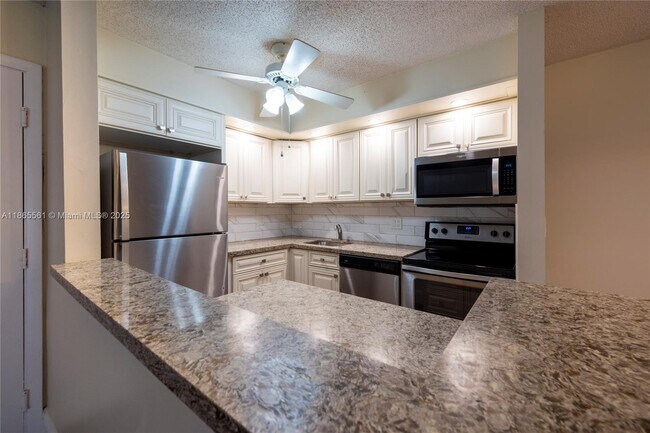 Building Photo - 9522 N Belfort Cir