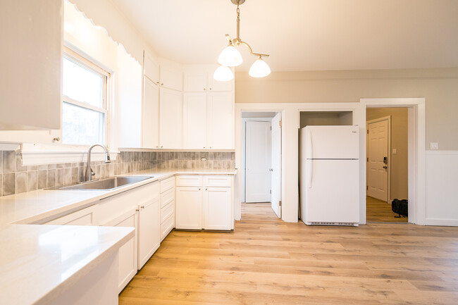 kitchen with bathroom and entry - 140 North St