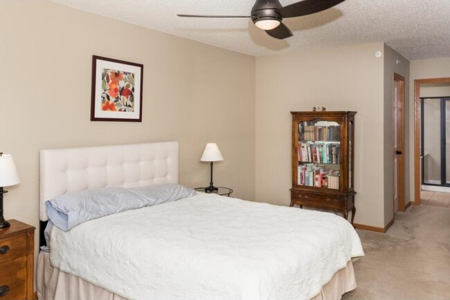 Master bedroom includes walk-in closets. - 9500 Washington Blvd