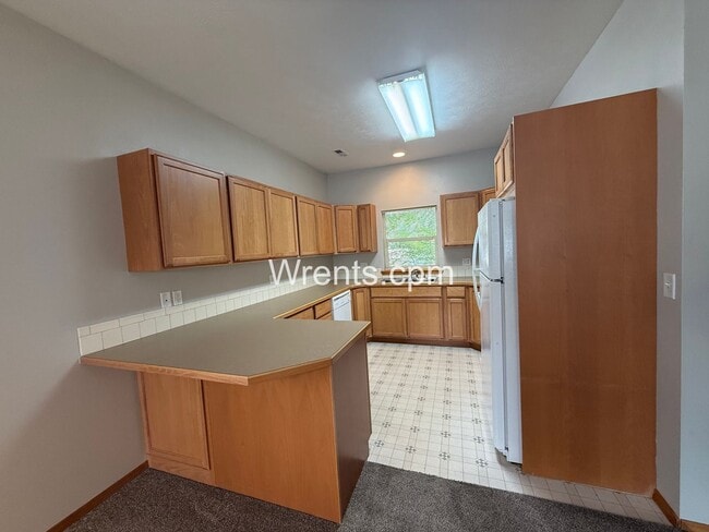 Building Photo - COMING SOON! South Hill Duplex with Garage & Utilities Included!