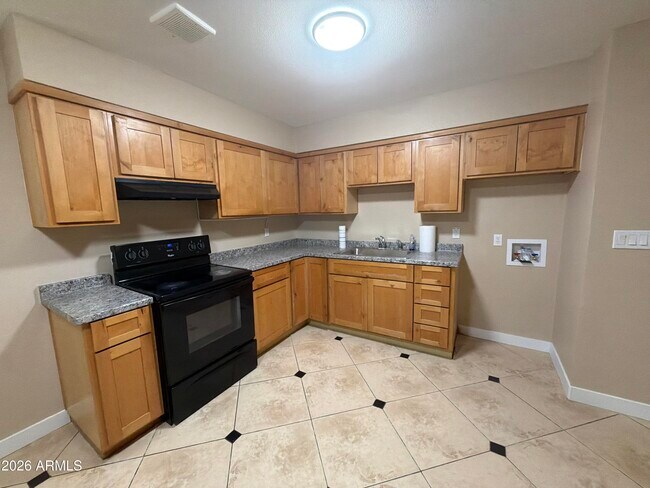 Foto del edificio - 5810 W Earll Dr