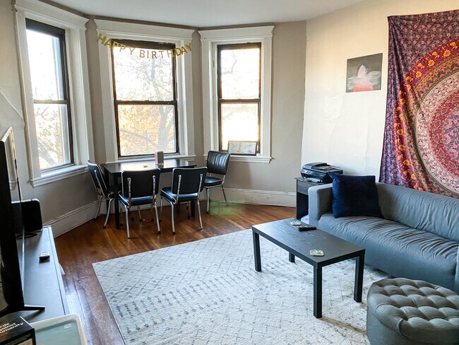 PLENTY OF SPACE for living room furniture + dining/study area! - 1066 Commonwealth Ave