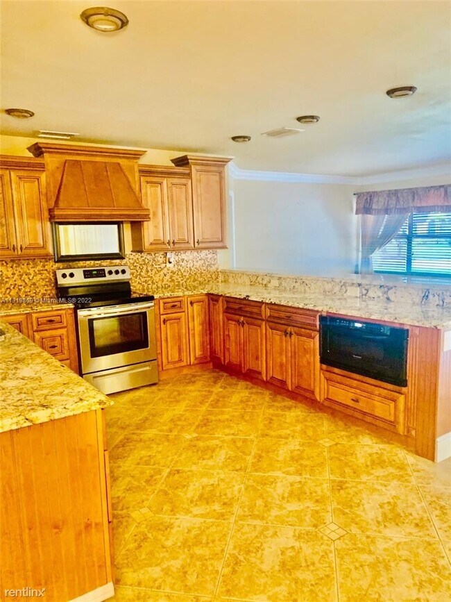 Building Photo - 4 br, 2 bath House - 11525 SW 54th St