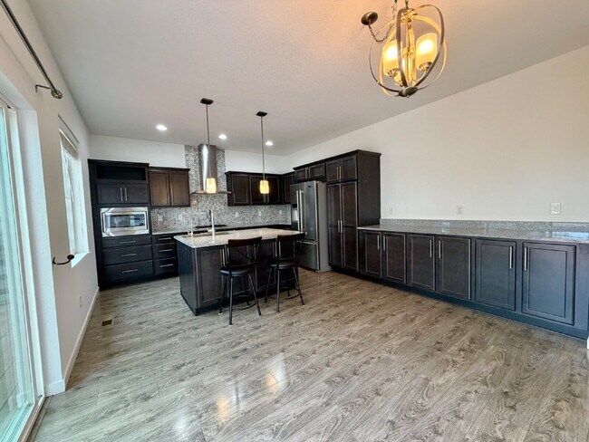 Photo - ~September Rent Free~ Gorgeous three Bedroom Home in Reunion with Private Office, Loft & Chef’s K...
