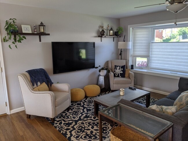 Upstairs Living Room with Large Bay Window - 4201 Collier Rd