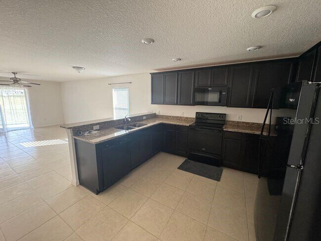 Building Photo - 6909 Crested Orchid Dr