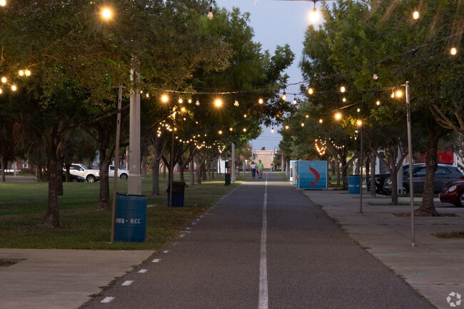 Strands of twinkle lights are draped over a street in Historic Brownsville.