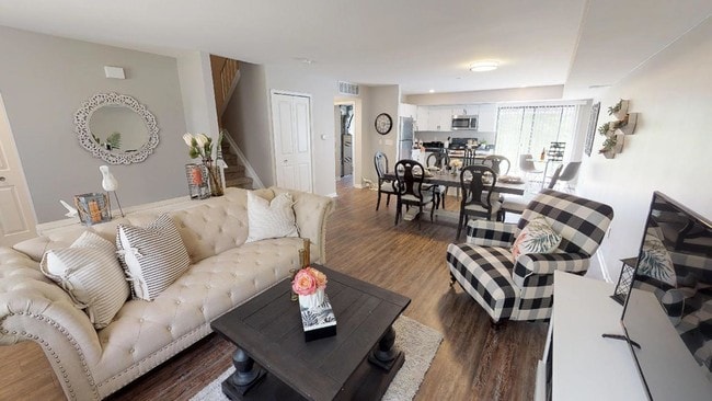Spacious living room flowing into dining room and kitchen - 83 West