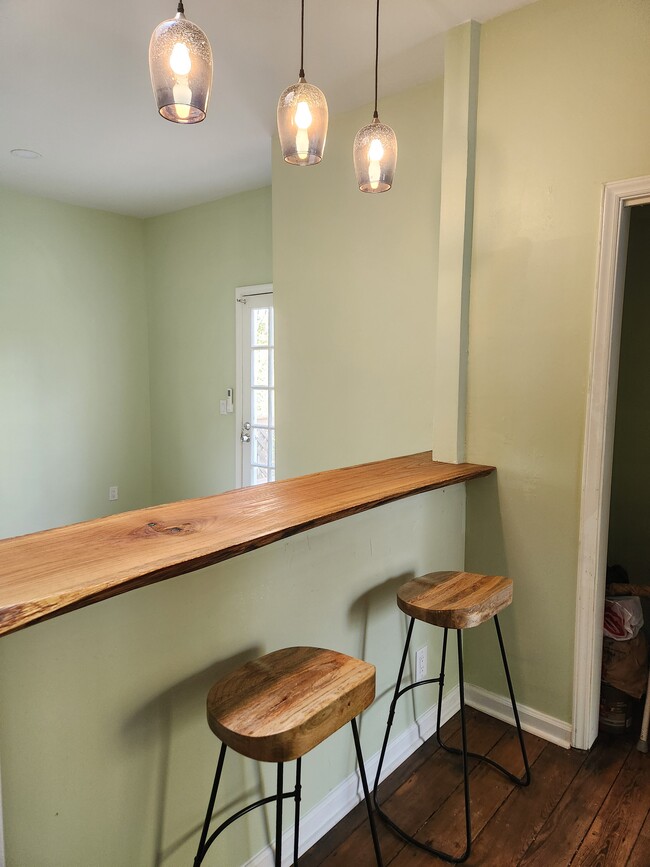 Live edge sit up bar - 310 N 5th Ave