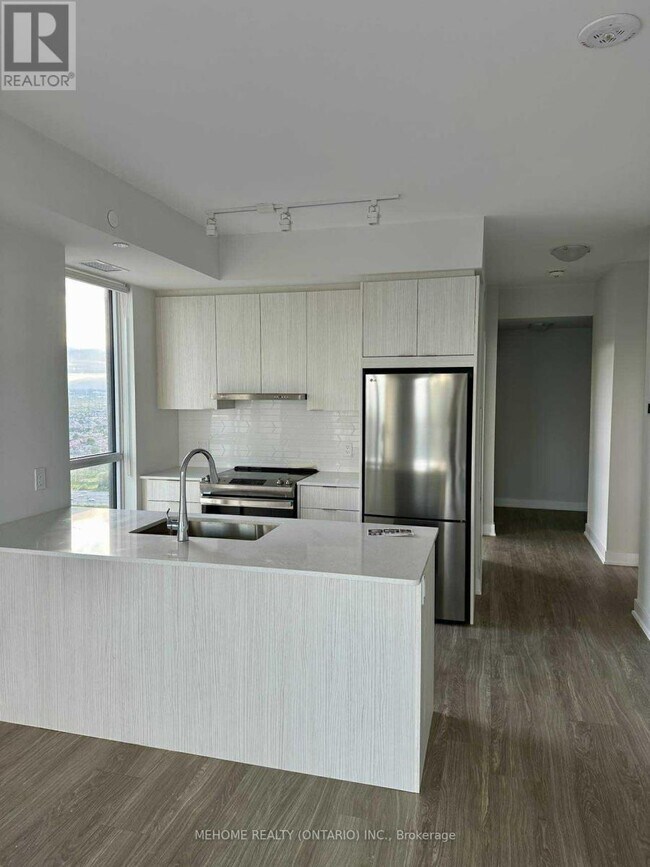 Photo du bâtiment - 430-3430 Square One Dr