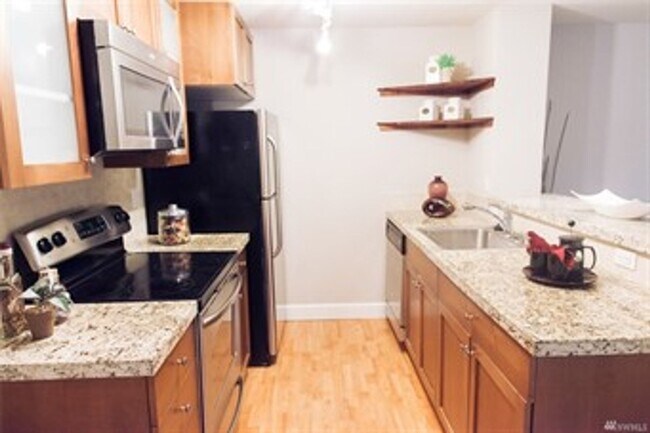 Building Photo - $300 off first months rent 2 Bedroom Condo...