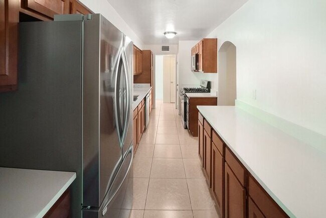 Building Photo - Beautifully remodeled through out with bright spacious open feeling!