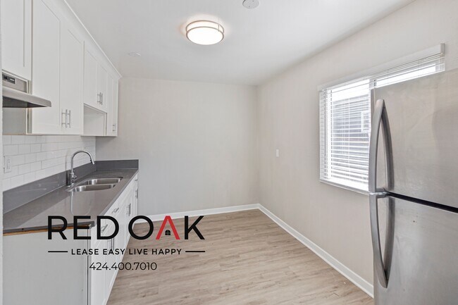Building Photo - ~1 Month FREE~ Delightful Two Bedroom with...