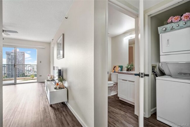 From Kitchen looking at living room and guest bathroom - 3054 Ala Poha Plz