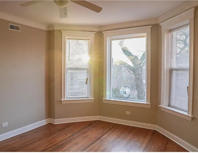 Building Photo - 6225 S Rhodes Ave