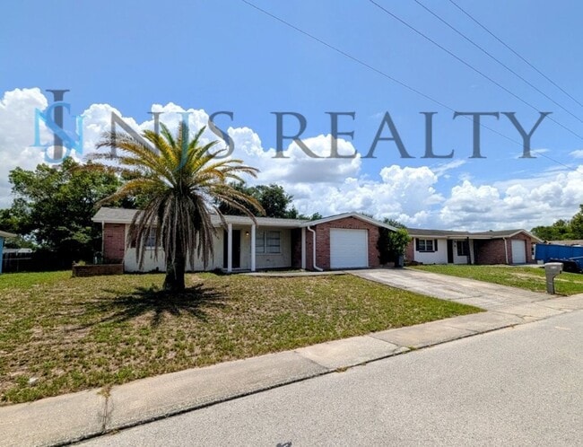 Building Photo - True 3 Bed~2 Bath~with garage. Over 1,000 sq ft, with updated kitchen & bathrooms, large open liv...