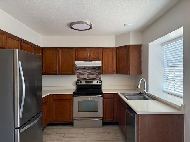 Building Photo - 5704 E Aire Libre Ave