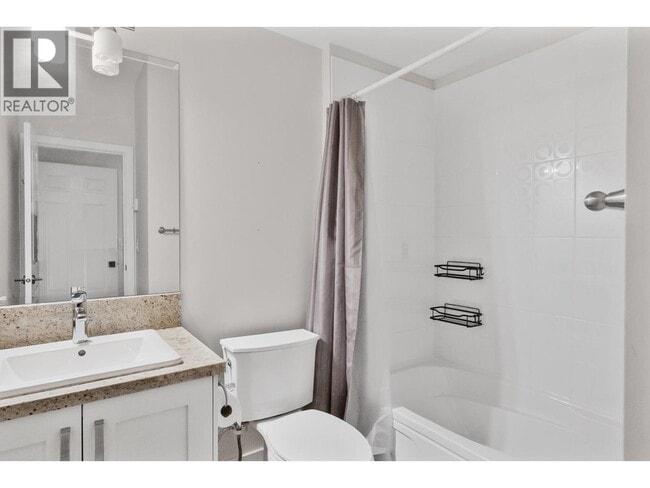 Photo du bâtiment - 1299 Coast Meridian Rd