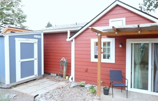 Backyard and shed. Sliding door enters to kitchen. - 251 NW Connell Ave
