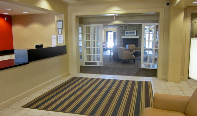 Lobby and Guest Check-in - Furnished Studio - Fayetteville