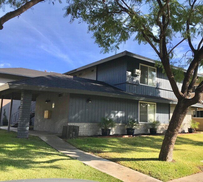 Front: Large Tree Provides Cool Shading - 1945 Evergreen St