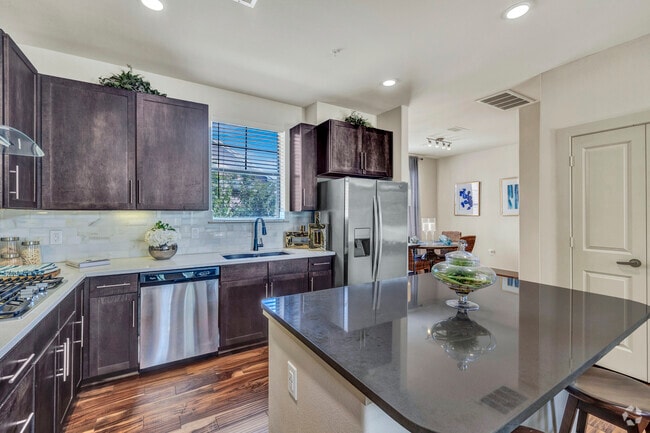 2BR, 2BA - 1,357SF - Kitchen/Dining Room - Townhomes at Woodmill Creek