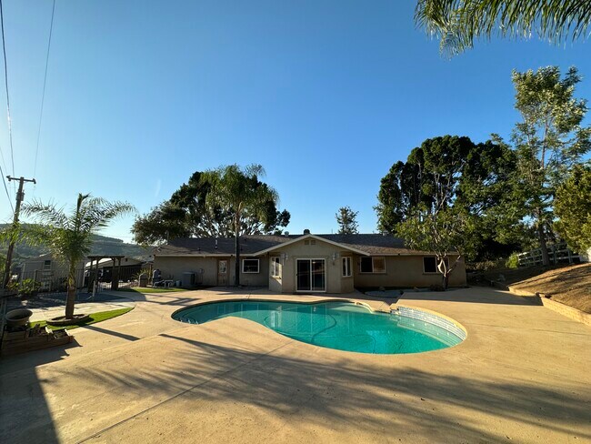 30,000 gallon pool 9’ deep and a huge slab for gazebo & outdoor furniture, or fire pit hangout. - 14396 Rios Canyon Rd