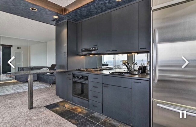 Foto del edificio - AMAZING FULLY FURNISHED 1 BEDROOM CONDO WI...