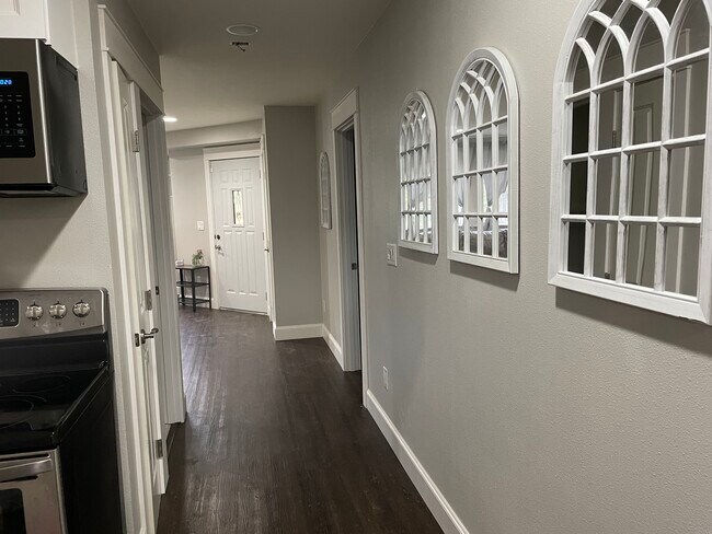 Hallway from kitchen to living room - 3216 36th Ave NE