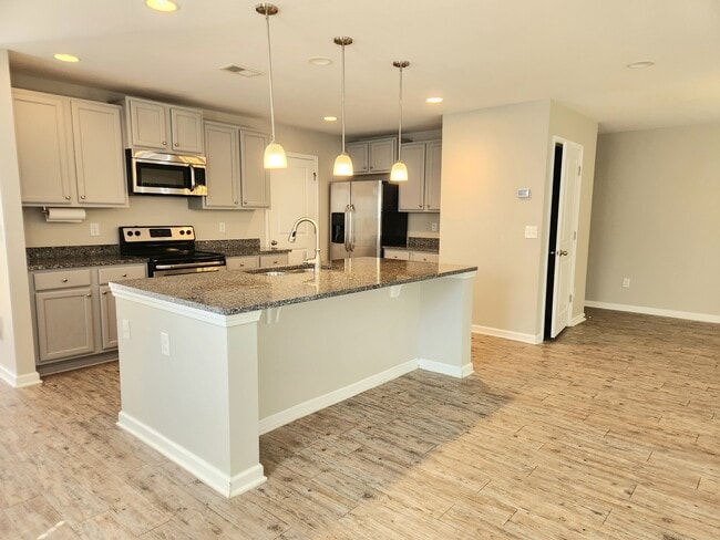 gourmet kitchen - 404 Cypress Knees Ln